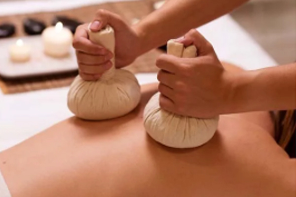 Kizhi Ayurvedic herbal bolus therapy at AVP Research Foundation